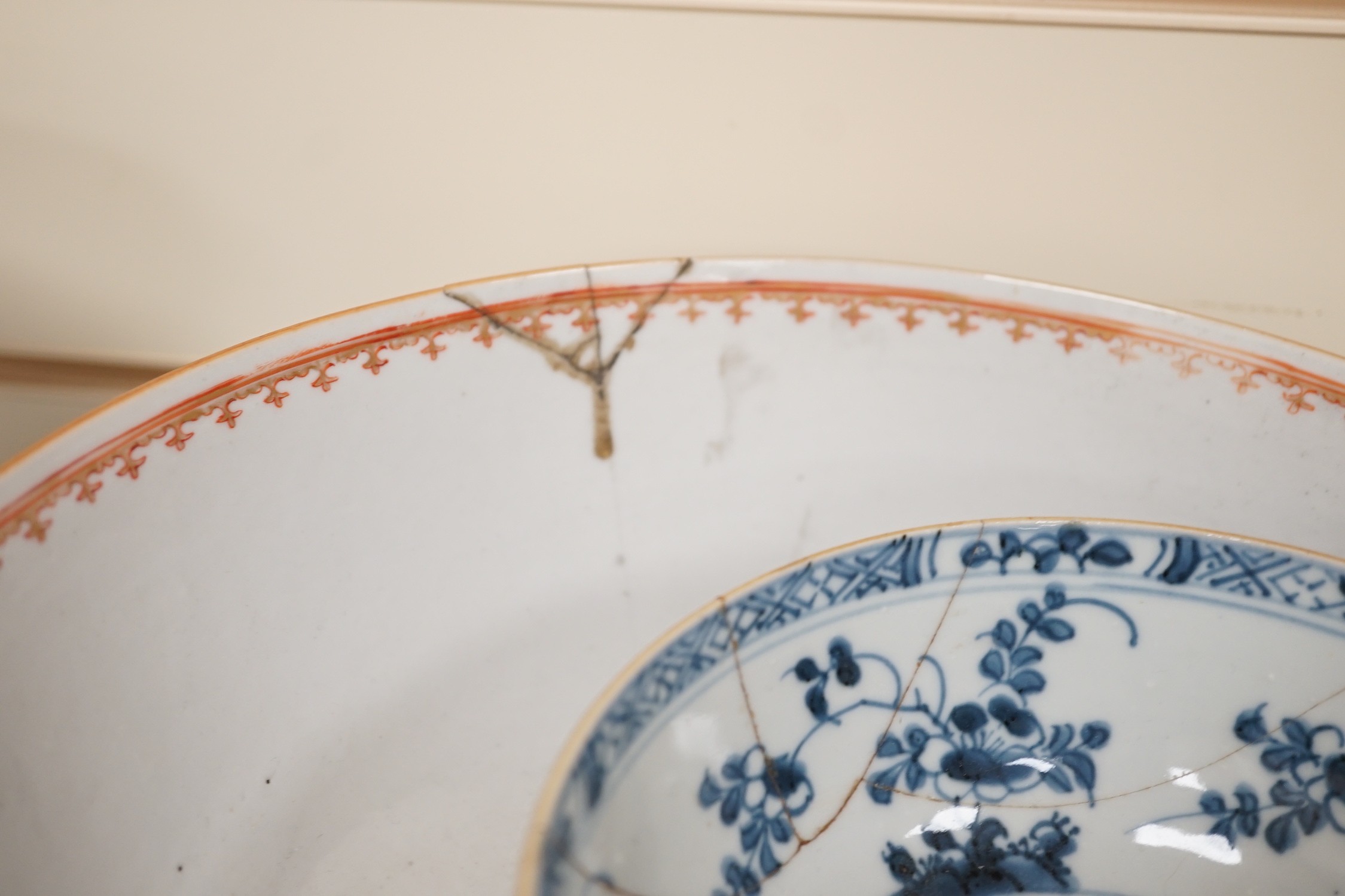 An assortment of 18th century and later Chinese porcelain, a tin-glazed earthenware charger and a Delft vase